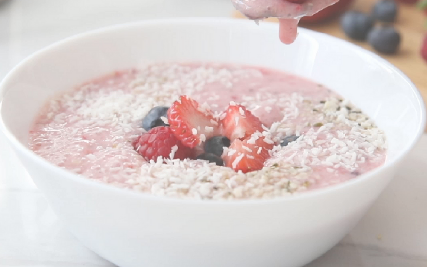 A bowl of raspberry flavoured oatmeal from Ener-C's raspberry Vitamin C mixed with fresh fruit on top